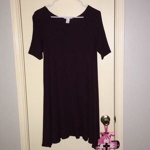 Dark maroon dress; flow type bottom.